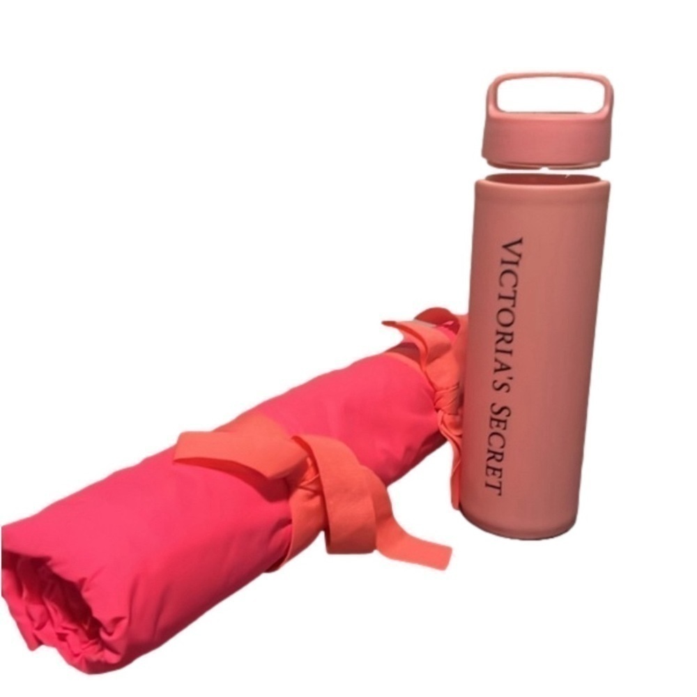 Collection of Victorias Secret items beach mat, glass water bottle